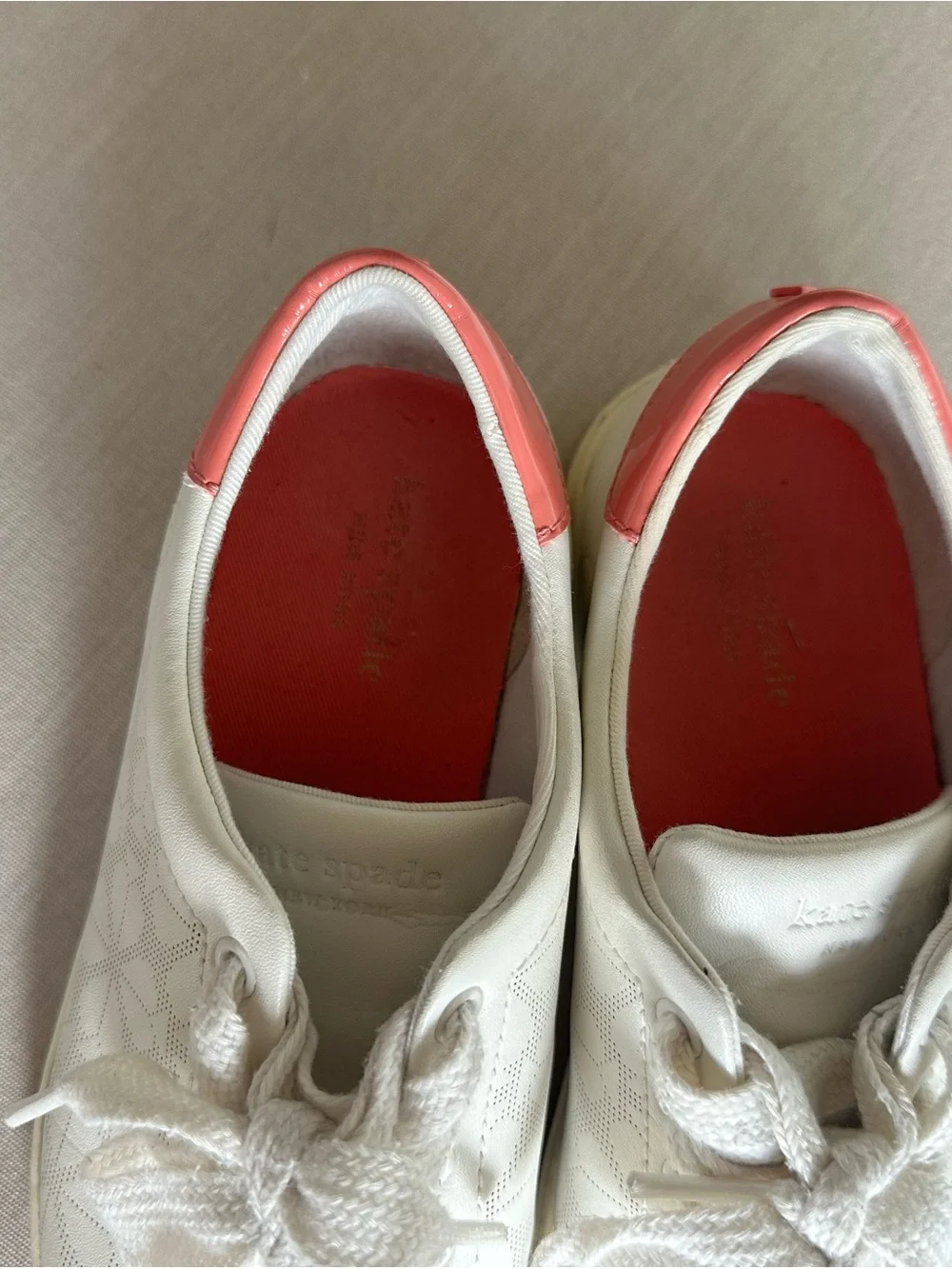 Kate spade Women's White Leather Sneakers with Pink Heel Accent